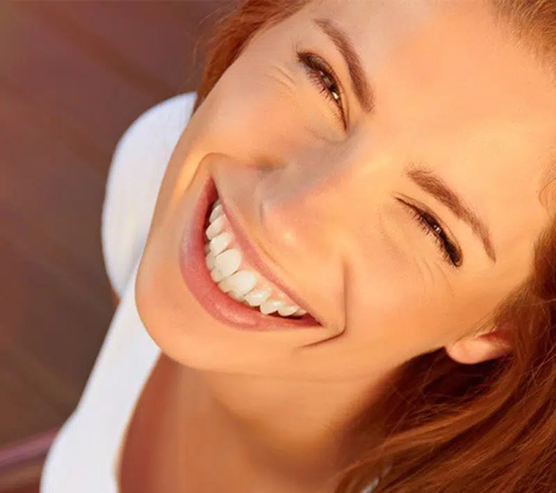 Young girl with pretty white teeth smiling in Chandler, AZ | Smiles of Chandler