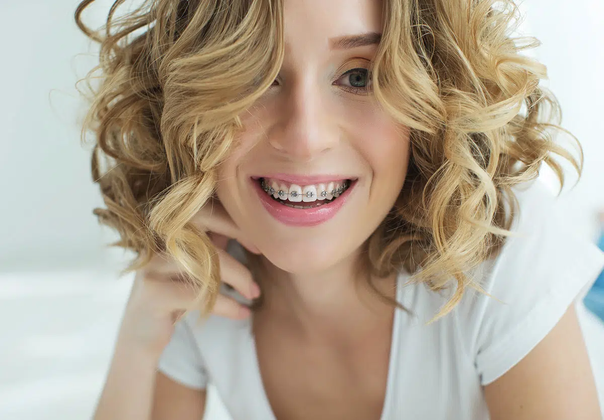 Portrait of a teen girl showing dental braces in Chandler, AZ | Smiles of Chandler