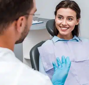 Woman Consulting with Dentist | Smiles of Chandler in Chandler, AZ